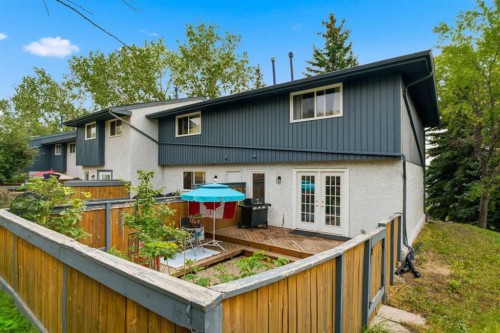 12-800 Bowcroft Place, Cochrane, AB - Outdoor With Exterior