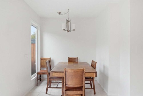 12-800 Bowcroft Place, Cochrane, AB - Indoor Photo Showing Dining Room