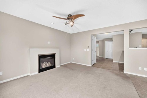 108 Sage Valley Drive Nw, Calgary, AB - Indoor Photo Showing Living Room With Fireplace
