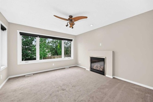 108 Sage Valley Drive Nw, Calgary, AB - Indoor Photo Showing Living Room With Fireplace