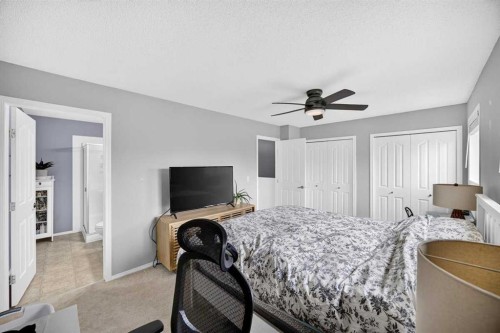 211 Bayside Point Sw, Airdrie, AB - Indoor Photo Showing Bedroom