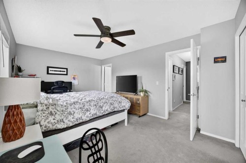 211 Bayside Point Sw, Airdrie, AB - Indoor Photo Showing Bedroom
