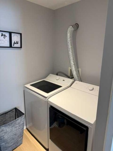 205-3205 Valleyview Park Se, Calgary, AB - Indoor Photo Showing Laundry Room