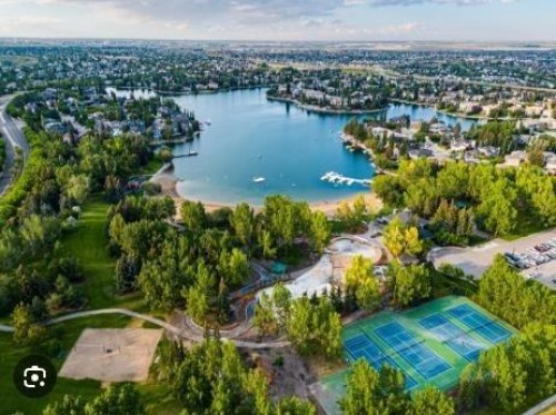 115 Mckenna Crescent Se, Calgary, AB - Outdoor With Body Of Water With View