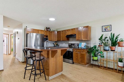 1916B 29 Avenue, Nanton, AB - Indoor Photo Showing Kitchen