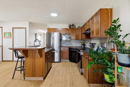 1916B 29 Avenue, Nanton, AB - Indoor Photo Showing Kitchen