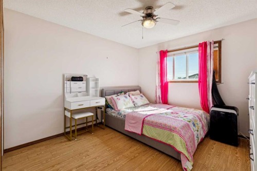 1916B 29 Avenue, Nanton, AB - Indoor Photo Showing Bedroom