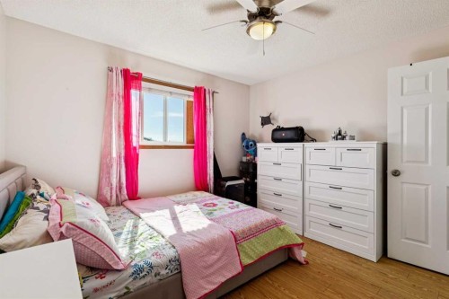 1916B 29 Avenue, Nanton, AB - Indoor Photo Showing Bedroom