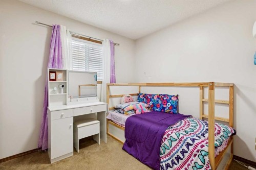 1916B 29 Avenue, Nanton, AB - Indoor Photo Showing Bedroom