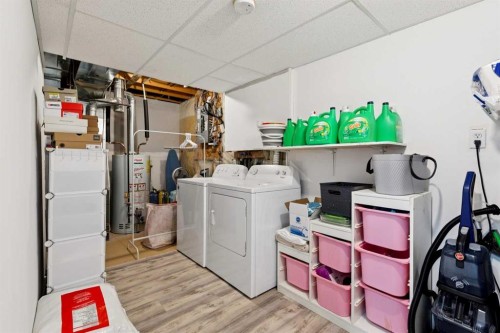 1916B 29 Avenue, Nanton, AB - Indoor Photo Showing Laundry Room