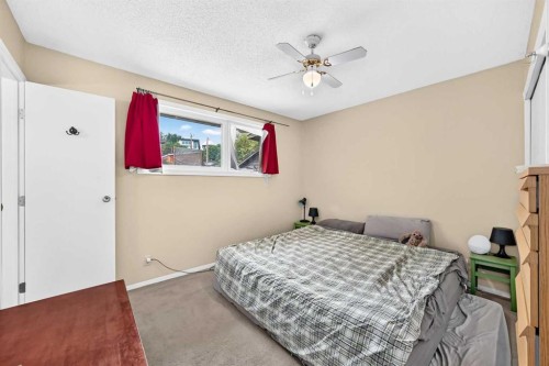 1117 8 Street Se, Calgary, AB - Indoor Photo Showing Bedroom