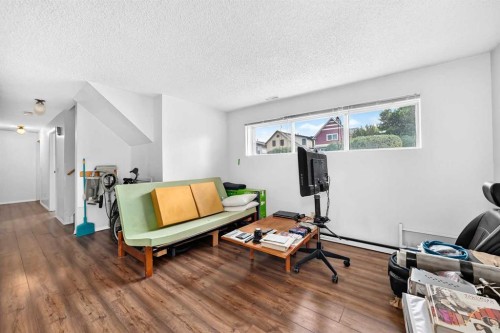 1117 8 Street Se, Calgary, AB - Indoor Photo Showing Living Room