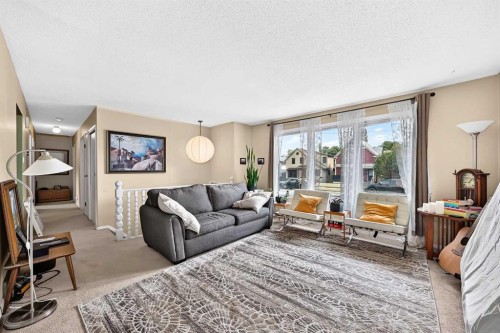 1117 8 Street Se, Calgary, AB - Indoor Photo Showing Living Room