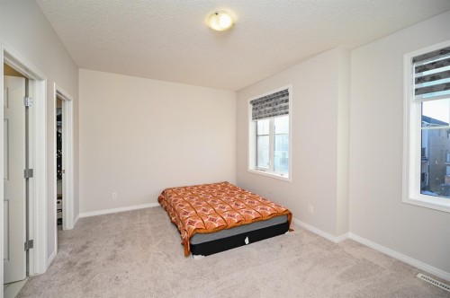 64 Cityside Common Ne, Calgary, AB - Indoor Photo Showing Bedroom