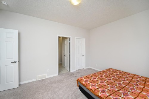 64 Cityside Common Ne, Calgary, AB - Indoor Photo Showing Bedroom