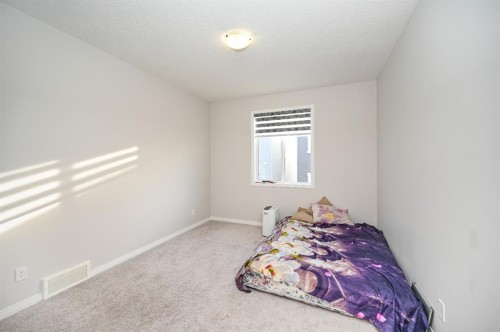 64 Cityside Common Ne, Calgary, AB - Indoor Photo Showing Bedroom
