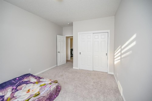 64 Cityside Common Ne, Calgary, AB - Indoor Photo Showing Bedroom