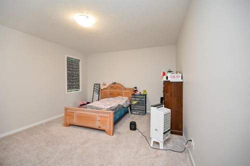 64 Cityside Common Ne, Calgary, AB - Indoor Photo Showing Bedroom