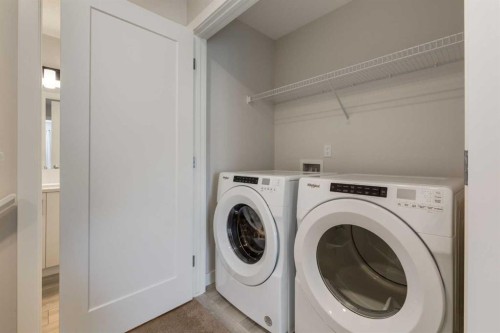 31 Tuscany Summit Square Nw, Calgary, AB - Indoor Photo Showing Laundry Room
