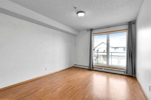 218-92 Saddletree Court Ne, Calgary, AB - Indoor Photo Showing Bedroom
