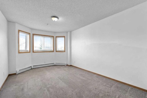218-92 Saddletree Court Ne, Calgary, AB - Indoor Photo Showing Bedroom