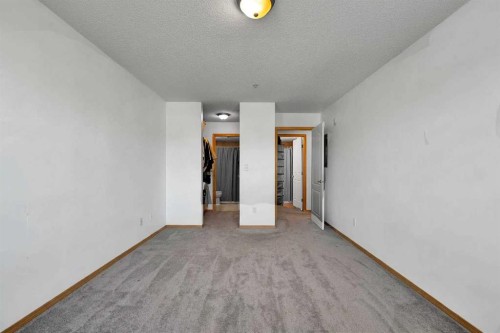 218-92 Saddletree Court Ne, Calgary, AB - Indoor Photo Showing Bedroom