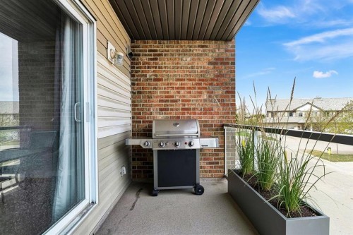 218-92 Saddletree Court Ne, Calgary, AB - Indoor Photo Showing Kitchen With Double Sink