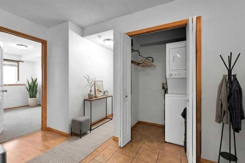 218-92 Saddletree Court Ne, Calgary, AB - Indoor Photo Showing Kitchen With Double Sink