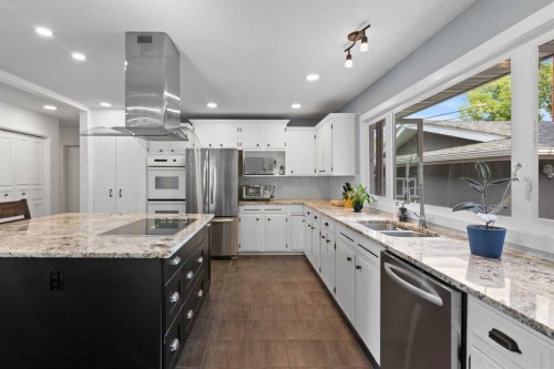 20 Mapleburn Drive Se, Calgary, AB - Indoor Photo Showing Kitchen With Double Sink With Upgraded Kitchen