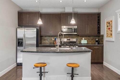 2-441 20 Avenue Ne, Calgary, AB - Indoor Photo Showing Kitchen With Double Sink