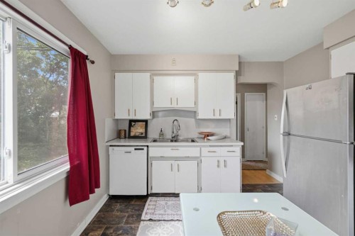 3711 Centre B Street Nw, Calgary, AB - Indoor Photo Showing Kitchen With Double Sink