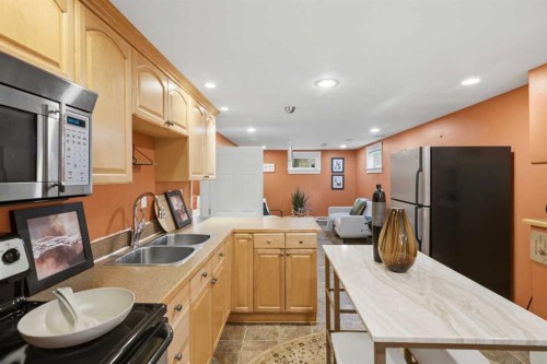 3711 Centre B Street Nw, Calgary, AB - Indoor Photo Showing Kitchen With Double Sink