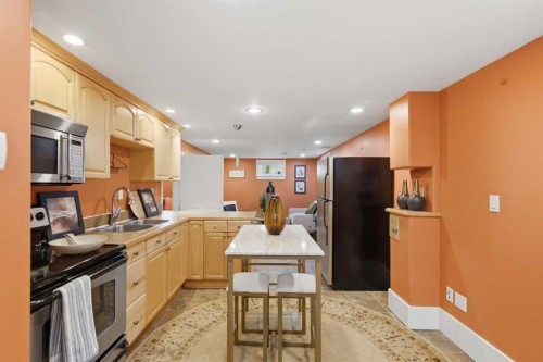 3711 Centre B Street Nw, Calgary, AB - Indoor Photo Showing Kitchen With Double Sink