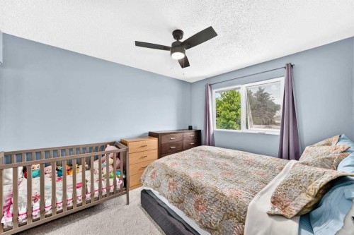2078 7 Avenue North, Lethbridge, AB - Indoor Photo Showing Bedroom