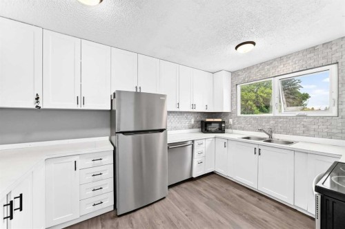 2078 7 Avenue North, Lethbridge, AB - Indoor Photo Showing Kitchen With Double Sink