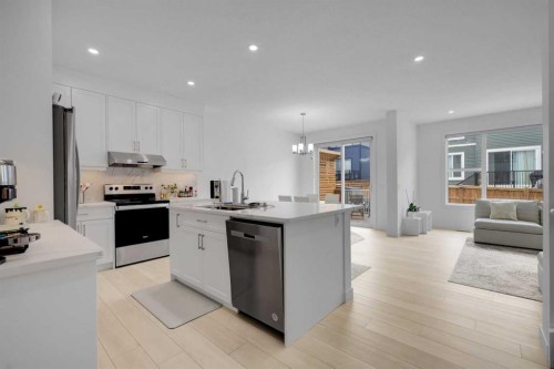 89 Amblehurst Gardens Nw, Calgary, AB - Indoor Photo Showing Kitchen With Double Sink With Upgraded Kitchen