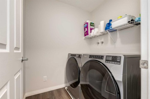 497 Hillcrest Road Sw, Airdrie, AB - Indoor Photo Showing Laundry Room