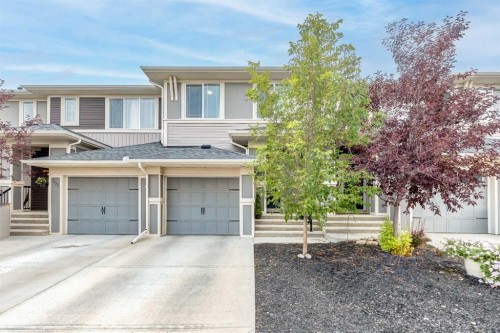497 Hillcrest Road Sw, Airdrie, AB - Outdoor With Facade