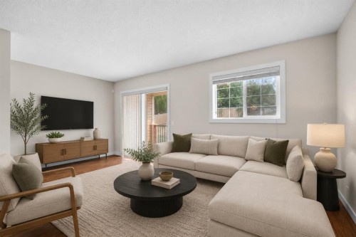 89 Pantego Lane Nw, Calgary, AB - Indoor Photo Showing Living Room