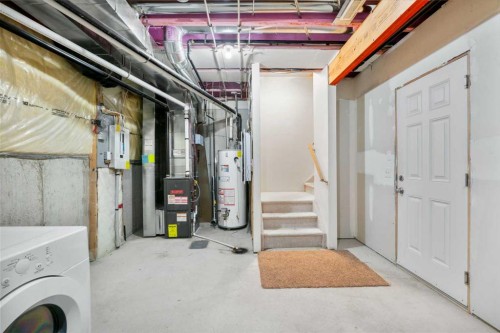 89 Pantego Lane Nw, Calgary, AB - Indoor Photo Showing Laundry Room