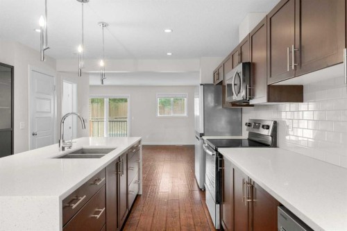 89 Pantego Lane Nw, Calgary, AB - Indoor Photo Showing Kitchen With Double Sink With Upgraded Kitchen