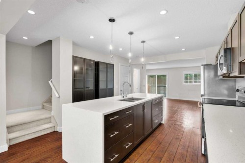89 Pantego Lane Nw, Calgary, AB - Indoor Photo Showing Kitchen With Double Sink With Upgraded Kitchen