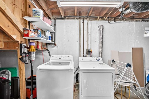 71 Dalton Bay Nw, Calgary, AB - Indoor Photo Showing Laundry Room
