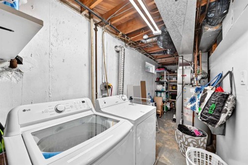 71 Dalton Bay Nw, Calgary, AB - Indoor Photo Showing Laundry Room