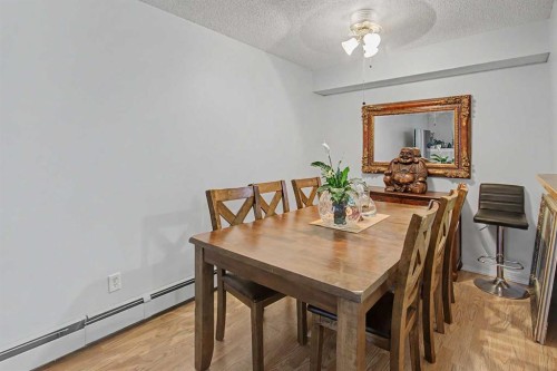 101-7724 Bowness Road Nw, Calgary, AB - Indoor Photo Showing Dining Room