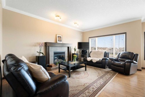 196 Nolanfield Way Nw, Calgary, AB - Indoor Photo Showing Living Room With Fireplace