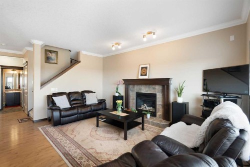 196 Nolanfield Way Nw, Calgary, AB - Indoor Photo Showing Living Room With Fireplace