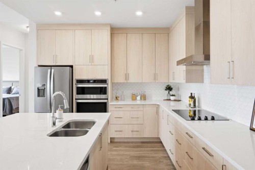 508-24 Mahogany Path Se, Calgary, AB - Indoor Photo Showing Kitchen With Double Sink With Upgraded Kitchen