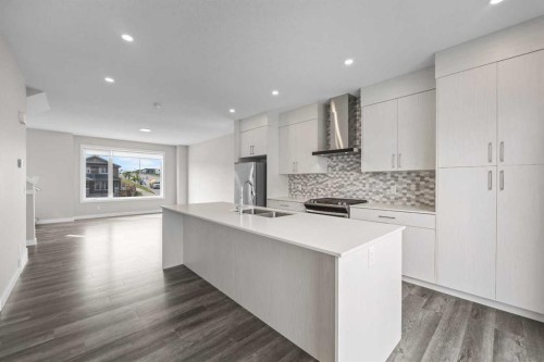 615 Evanston Link Nw, Calgary, AB - Indoor Photo Showing Kitchen With Double Sink With Upgraded Kitchen