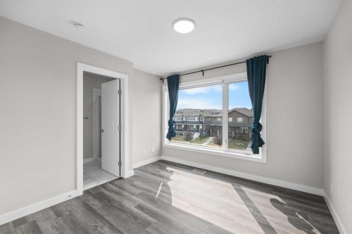 615 Evanston Link Nw, Calgary, AB - Indoor Photo Showing Other Room
